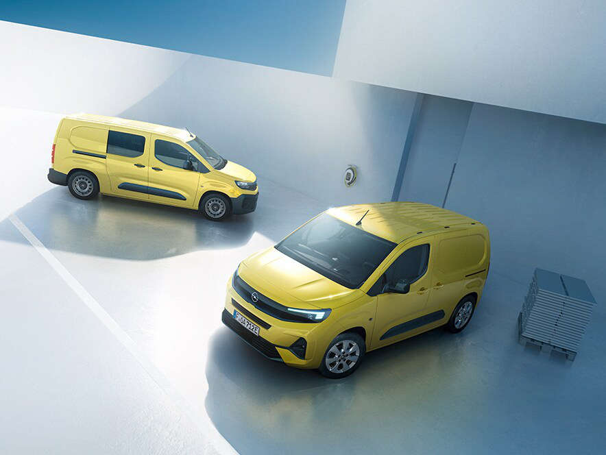 Вигляд з лівого боку на новий Opel Combo Cargo жовтого кольору